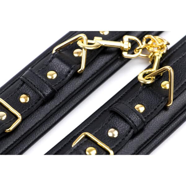 11469-black-soft-padded-leather-wrist-cuffs-with-golden-chain-Limassol-sex-shop 11469-black-soft-padded-leather-wrist-cuffs-with-golden-chain-Limassol-sex-shop