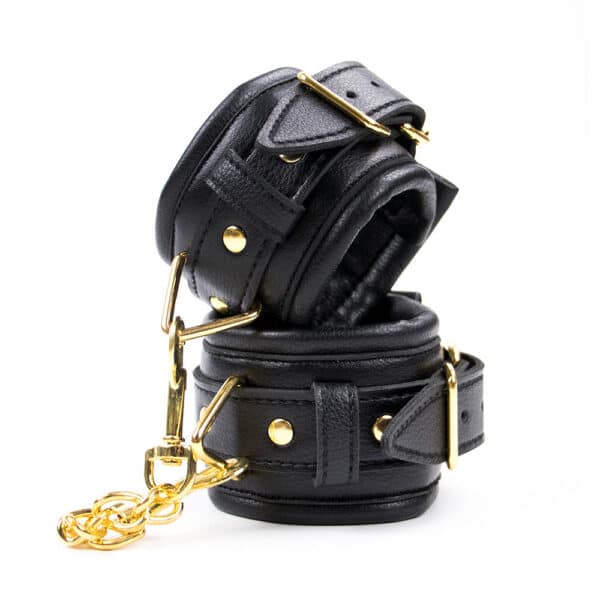 11469-black-soft-padded-leather-wrist-cuffs-with-golden-chain-sexshop-Pafos 11469-black-soft-padded-leather-wrist-cuffs-with-golden-chain-sexshop-Pafos
