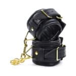 11467-black-leather-padded-ankle-leg-cuffs-with-golden-chain-ek252420078-limassol-sexshop